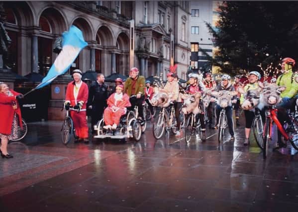 GET SET: Leeds Lord Mayor Coun Jane Dowson waved off charity riders from Leeds City Square.
