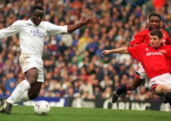 Tony Yeboah scores in the 1995 Christmas Eve clash between Leeds and Manchester United.