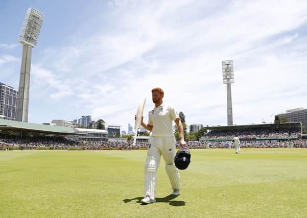 England's Jonny Bairstow walks off after being dismissed on day two at the WACA. Picture: Jason O'Brien/PA