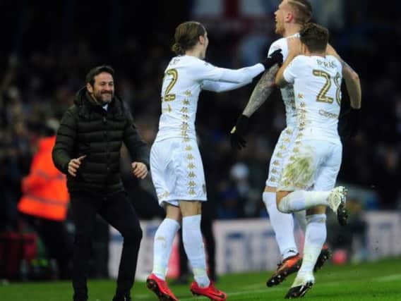 Thomas Christiansen celebrates Pontus Jansson's goal with his Leeds United players