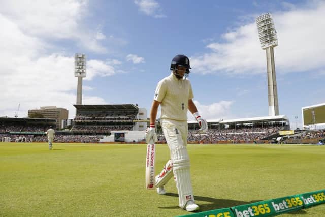 England's Joe Root walks off after being dismissed on day four at the WACA. Picture date: Sunday December 17, 2017. See PA story CRICKET Australia. Photo credit should read: Jason O'Brien/PA.