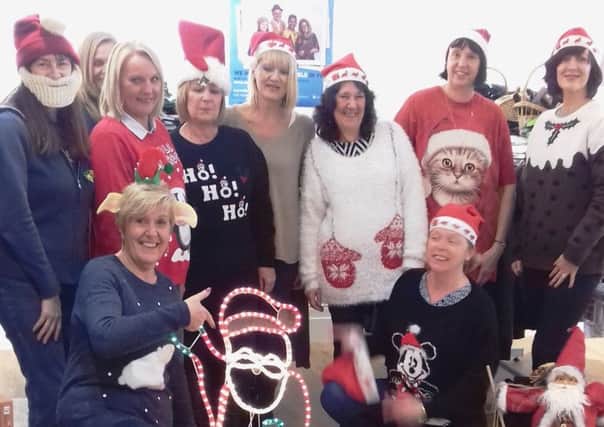 Staff from the Department for Work and Pensions taking part in woolly fundraising for Wheatfields Hospice. Picture: Wheatfields Hospice.