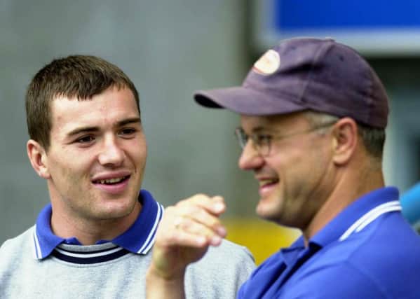 Leeds Rhinos' 2001 captain and coach 
Iestyn Harris and Dean Lance.