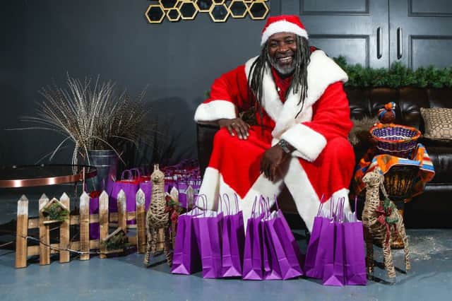 GIVING SOMETHING BACK: Cleve Freckleton as Rasta Claus. PIC: SWNS
