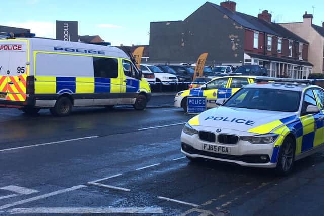 Police on King Street North in Chesterfield. PIC: SWNS