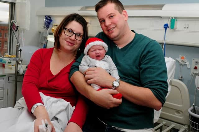 Charlotte Sinclair and Matthew Tindall pictured with their Christmas Day baby Eliza. PIC: Simon Hulme