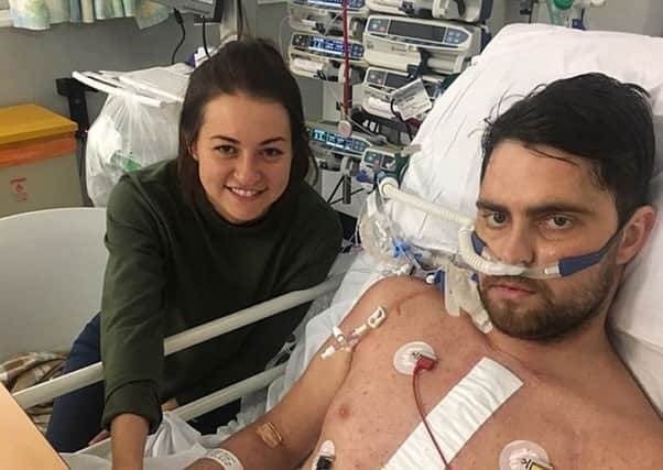 Aaron Mellis and Amber Hagan after Aaron had heart surgery, as the 29-year-old said that getting a heart transplant at Christmas would be an "incredible gift".  PIC: PA