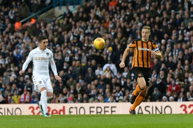 Pablo Hernandez chips the ball over Allan McGergor to scores Leeds' opener against Hull City. (Picture: Bruce Rollinson)