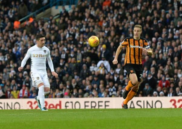 Pablo Hernandez chips the ball over Allan McGergor to scores Leeds' opener against Hull City. (Picture: Bruce Rollinson)