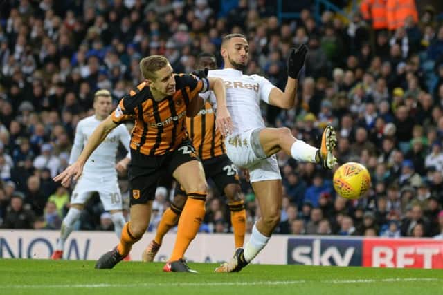Kemar Roofe is challenged by Michael Dawson as he gets in a shot.
 (Picture: Bruce Rollinson)