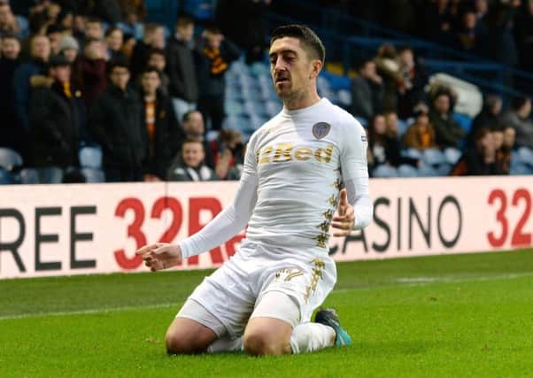 Sliding in: Pablo Hernandez slides on his knees after scoring the winning goal against Hull City on Saturday. Not that he is getting carried away by Leeds Uniteds recent good form.