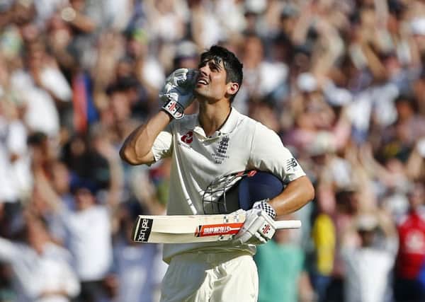 Salute: England's Alastair Cook celebrates his century at the MCG. Picture: Jason O'Brien/PA