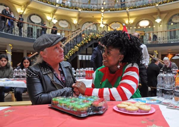 Marvina Newton (right)  founder of the Leeds charity Angels of Youth chats to Dana Lockwood at the Corn Exchange. PIC: Tony Johnson