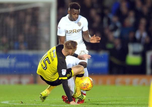 OUCH: Leeds United's Ronaldo Viera is caught by a late lunge by Burton Albion's Tom Naylor. Picture by Tony Johnson.