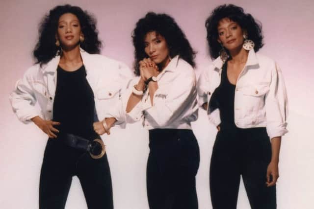 Sister Sledge performed as a trio in the 1990s.