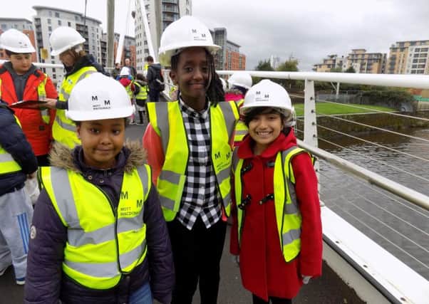 STARTING YOUNG: Pictured on a visit to Leeds city centre are Luliyana Daniel, Feruz Redie and Fatima Begum.