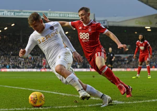 GENIUS: Leeds United's star man Samu Saiz keeps the ball in play as Nottingham Forest's Ben Osborn closes in. Picture by Jonathan Gawthorpe.