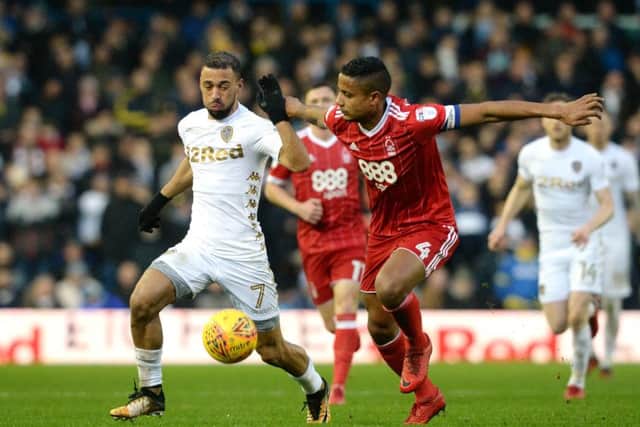 Kemar Roofe and Michael Mancienne battle for the ball during the New Year's Day encounter at Elland Road. Picture: Bruce Rollinson.
