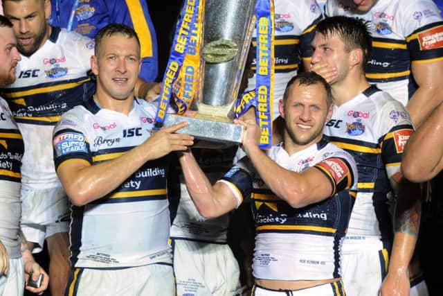 MOVED ON: Carl Ablett's former Leeds Rhinos' team-mates, Danny McGuire, left, and Rob Burrow.  Picture: Bruce Rollinson