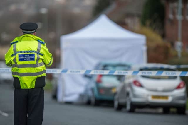CRIME SCENE: Police on Rosgill Drive, Seacroft. PIC: James Hardisty