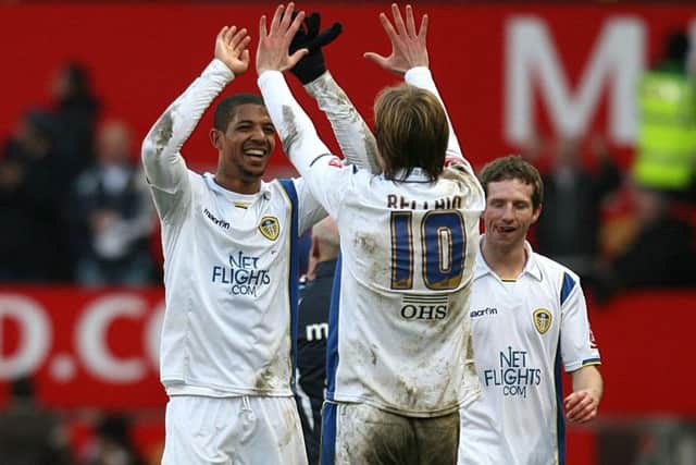 Leeds United's Luciano Becchio and Jermaine Beckford (left) celebrate after the final whistle at Old Trafford iin 2010.