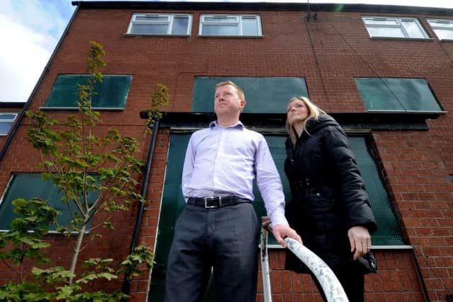 File photo of Rob Greenland and Gill Coupland, who campaigned get empty homes in Leeds back into uses. They are pictured in 2012 near properties off Beeston Road.