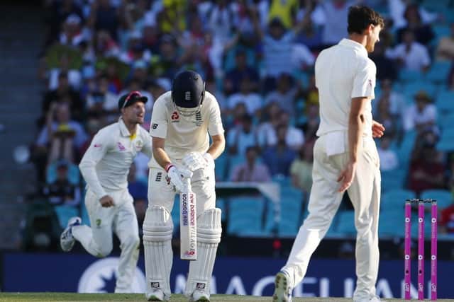 Gone: England's Joe Root  after being dismissed in Sydney. Picture: Jason O'Brien/PA