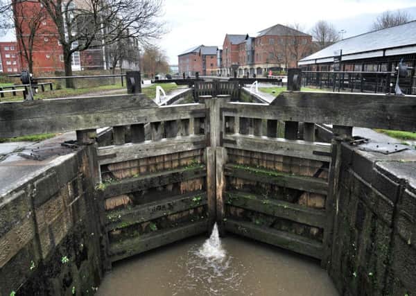 Picture by Julian Brown 09/12/16

View of the canal

The historic Leeds and Liverpool Canal is honoured with a presentation of a Special Award for Civil Engineering Heritage.The award certificate was presented to representatives of the Canal & River Trust at Wigan Pier, which marks the start of the famous Wigan Flight of 21 locks, one of the canal's most important features.