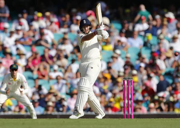 England's Joe Root pulls through mid-wicket on day one at the SCG. Picture: Jason O'Brien/PA