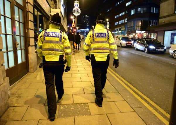 File photo of police on patrol in Albion Street, Leeds.  Picture: Bruce Rollinson