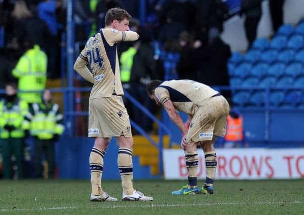 Marius Zaliukas and Jason Pearce show their frustration after Leeds United's 6-0 defeat at Sheffield Wednesday in 2014.
