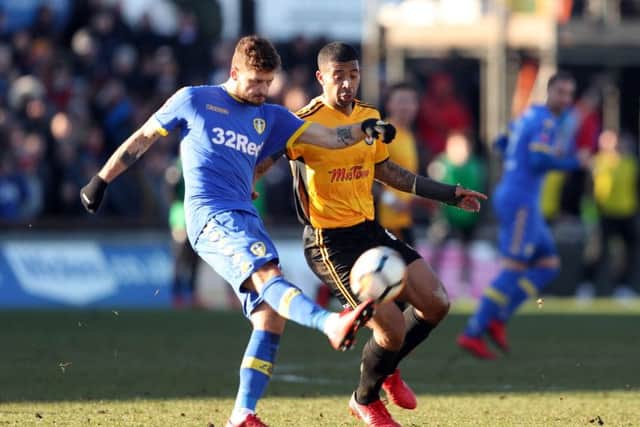 BAD DAY: Newport County's Joss Labadie (right) and Leeds United's Mateusz Klich battle. Picture: David Davies/PA