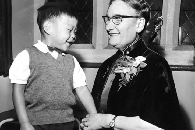 Leeds, 22nd August 1966
Miss Gladys Aylward, the missionary, with her adopted son Gordon, aged four, who was abandoned by his parents in Formosa, Miss Aylward spoke last night at St. George's Church, Leeds, where she described her experiences in China.
BACKGROUND:
Gladys Aylward (Chinese name: , pinyin: à i wei dé)
(24 February 1902 - 3 January 1970)
was the Protestant missionary to China whose story was told in the book The Small Woman by Alan Burgess, published in 1957. In 1958, the story was made into the Hollywood film The Inn of the Sixth Happiness, starring Ingrid Bergman.