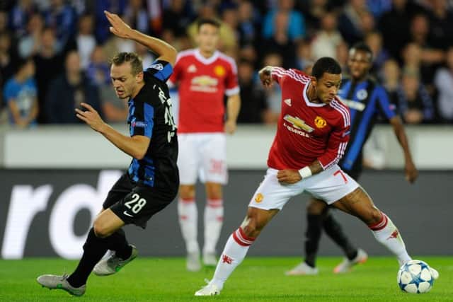 Brugge's Laurens De Bock, left, playing against Manchester United, is having a medical at Leeds United. (AP Photo/Laurent Dubrule)