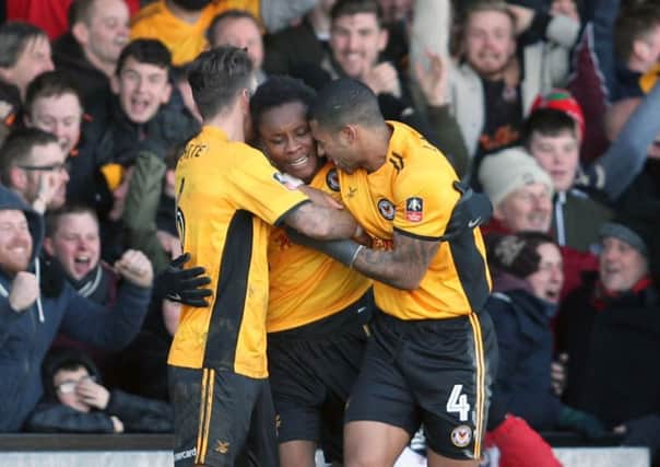 Newport County's Shawn McCoulsky (centre) celebrates his winning goal against Leeds United.