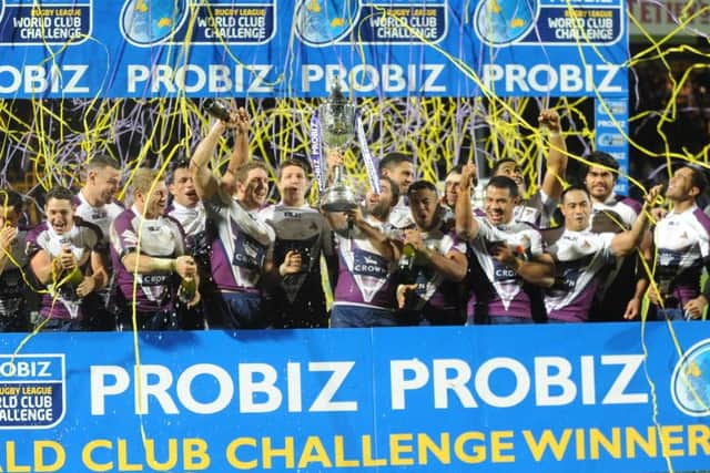 Melbourne Storm celebrate their 2013 World Club Challenge victory over Leeds Rhinos.
