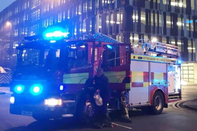 Firefighters at Nottingham railway station (PA)