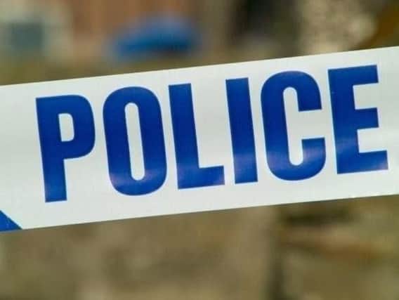 A woman was injured after being robbed of her handbag in Cleckheaton