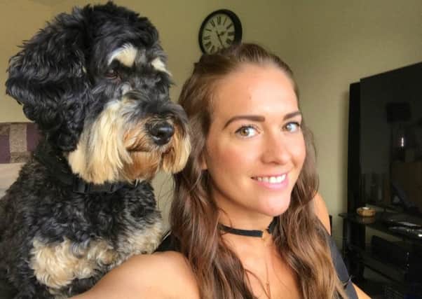 BEST FRIEND: Becky Baker has made an app for dog owners after being inspired by her Cockerpoo Buddy.