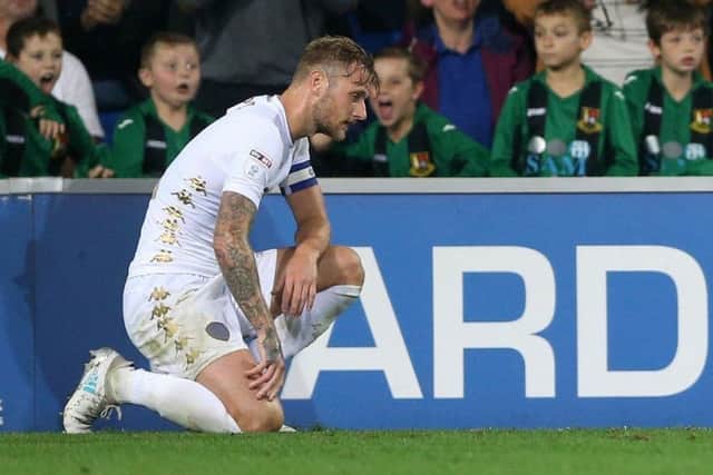 Leeds United's Liam Cooper shows his frustration after being shown a red card at Cardiff City.