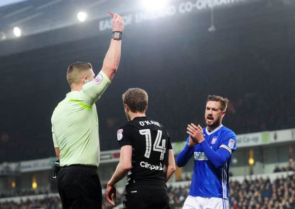 Off you go: Eunan O'Kane is sent off against Ipswich. Picture: Simon Hulme