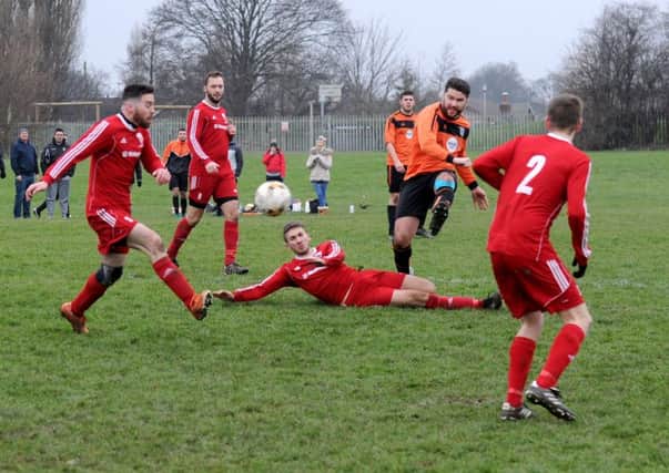 Colton's Chris Hicks tries a shot on goal during Saturday's 4-2 Hancock Cup defeat at Shire Reserves. PIC: Steve Riding