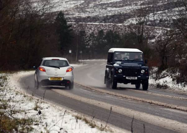 Wintery conditions in the Peak District made for difficult driving conditions on the A57 which wsa closed at Snake Pass. PIC: Scott Merrylees