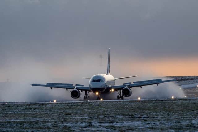 A British Airways flight from Heathrow lands in the snow (Charlotte Graham)