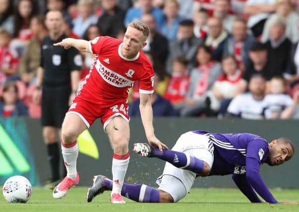 Adam Forshaw, left, is to undergo a medical at Leeds on Thursday.