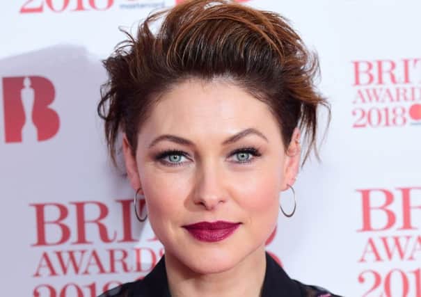 Emma Willis goes for an updated classic glam look for the Brit Awards 2018 nominations event last weekend, with eyes top lined and lips drawn precisely in berry red. try Charlotte Tilbury Lip Cheat Berry Naughty, Â£16. Picture: Ian West/PA Wire.
