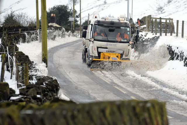 17 Jan 2018......A snow plough clears the road in Holme village as snowy conditions across Yorshire look to continue for several more days. Picture Scott Merrylees