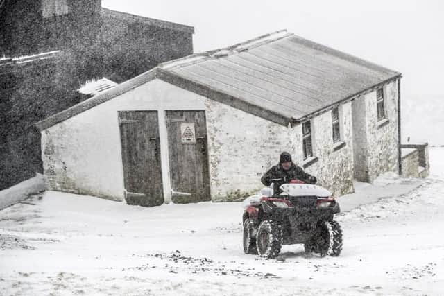 A farmer in a blizzard in Langdon Beck as the area in the North Pennines was blanketed by snow overnight. PRESS ASSOCIATION Photo. Picture date: Tuesday January 16, 2018. Frequent wintry showers have pushed in overnight with the Met Office issuing yellow warnings for snow and ice across much of Scotland and Northern Ireland. See PA story WEATHER Cold. Photo credit should read: Danny Lawson/PA Wire