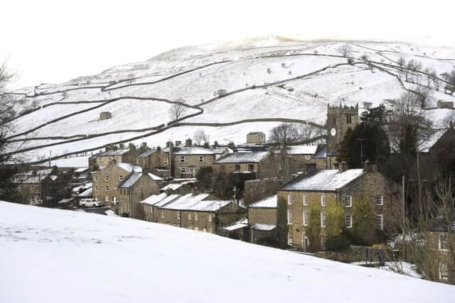 Muker in Swaledale, North Yorkshire, blanketed in snow, as yellow snow and ice warnings are in place for northern England and Northern Ireland and much of Wales. PRESS ASSOCIATION Photo. Picture date: Wednesday January 17, 2018. See PA story WEATHER Cold. Photo credit should read: John Giles/PA Wire