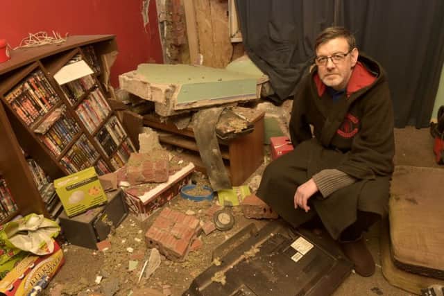 Andrew Andersoo in his house in Beeston after the crash